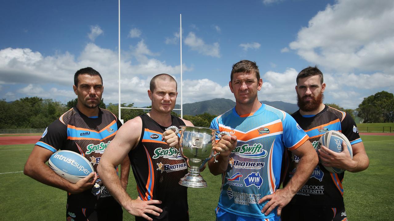 The Northern Pride won the Queensland Cup, and contested the inaugural State Championship in Sydney. Pictured (from left) Hezron Murgha, Jason Roos, coach Jason Demetriou and Tyrone McCarthy with the Intrust Super Cup at Barlow Park. Picture: Brendan Radke.