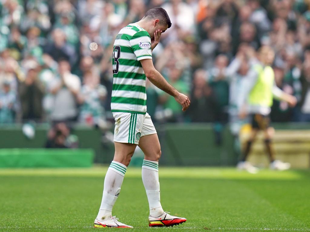 Tom Rogic wipes away tears as he walks off the field for the last time as a Celtic player. Picture: Jane Barlow/PA Images/Getty Images