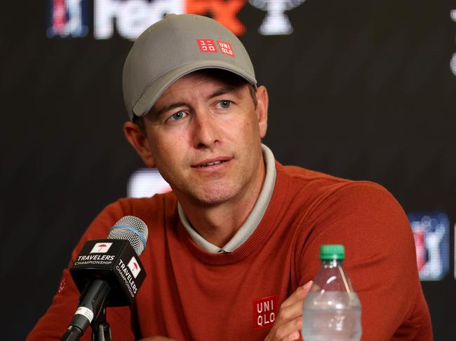 CROMWELL, CONNECTICUT - JUNE 21: Adam Scott of Australia answers a question during a news conference after playing a practice round prior to the Travelers Championship at TPC River Highlands on June 21, 2023 in Cromwell, Connecticut. (Photo by Rob Carr/Getty Images)