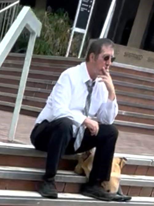 Greyhound bus driver, Peter Cafe who is charged with three counts of murder and two counts of grievous bodily harm sat outside Townsville court house. June, 6 2025.