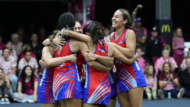 WGC Sharks players celebrate at full time after winning their third straight Cairns Netball premiership in the Cairns Netball Division 1 grand final match between the WGC Sharks and the Cairns Leprechauns. Picture: Brendan Radke