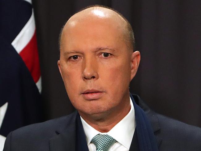 Home Affairs Minister Peter Dutton holding a press conference at Parliament House in Canberra.