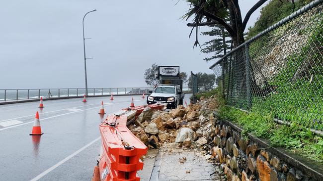 A landslip at Kirra Hill in Coolangatta caused a lane of traffic to be blocked when debris crashed through fencing and onto the roadway. Picture: NCA NewsWire / Scott Powick