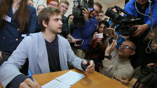 Ruslan Sokolovsky, a blogger who played Pokemon Go on his phone in a church, speaks to the press during a hearing at a court in Yekaterinburg on May 11, 2017. Picture: Konstantin Melnitskiy