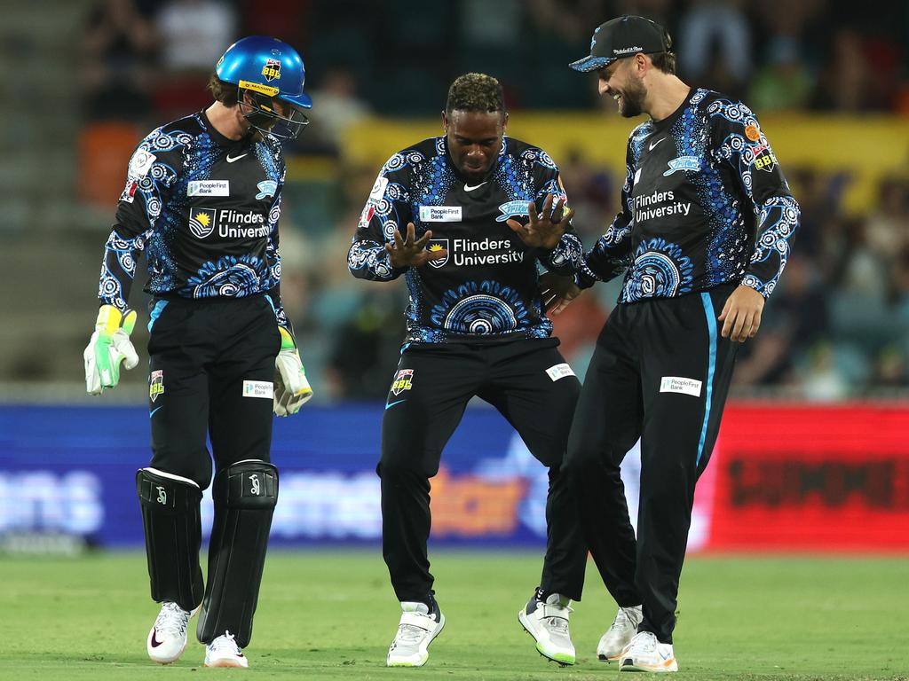 Fabian Allen (centre) celebrates after finally dismissing the teenager. (Photo by Mark Metcalfe/Getty Images)