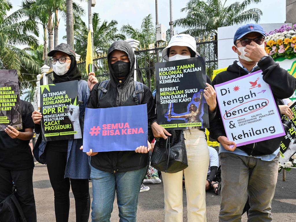 Activists holding a protest against the new criminal code in Jakarta. Picture: Adek Berry/AFP