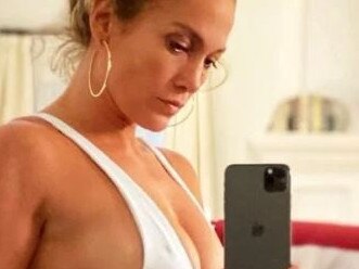 Jennifer Lopez shows off her figure as she sends a firm message.