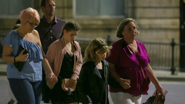 Young concertgoers and their parents leaving the Manchester Arena after the bomb. Picture: Dave Thompson/Getty Images