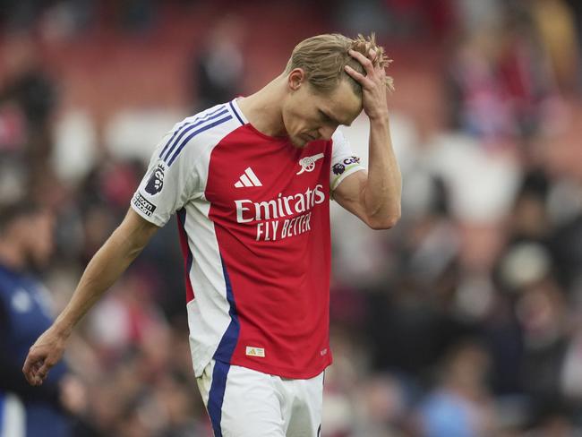 Arsenal's Martin Odegaard leaves the field at the end of the English Premier League soccer match between Arsenal and Bournemouth at Emirates stadium in London, Saturday, May 3, 2025. (AP Photo/Kin Cheung)