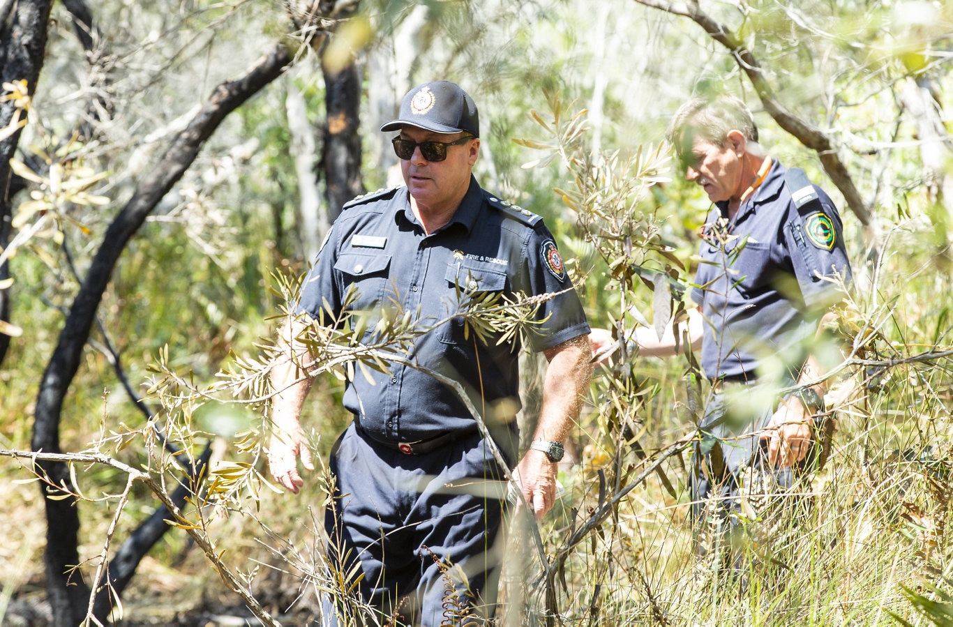 Fire investigators at the scene near the ignition point of Wednesday's Peregian Beach bushfire. Photo: Lachie Millard