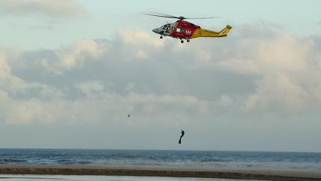 The group of six people got into trouble in the surf at the beach north of Coffs Harbour. Picture: Frank Redward