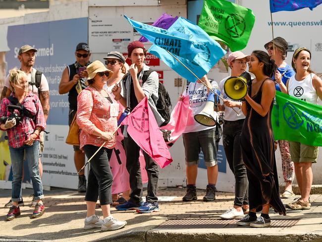 Activists participate in an Extinction Rebellion protest in Brisbane on Wednesday. Picture: AAP Image/Albert Perez