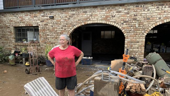 Nicky Smith outside her duplex on Tweed Valley Way where her entire home was flooded. Picture: Liana Walker