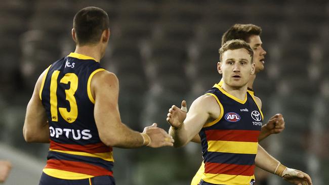 Rory Laird celebrates a goal with Taylor Walker. Picture: Getty Images