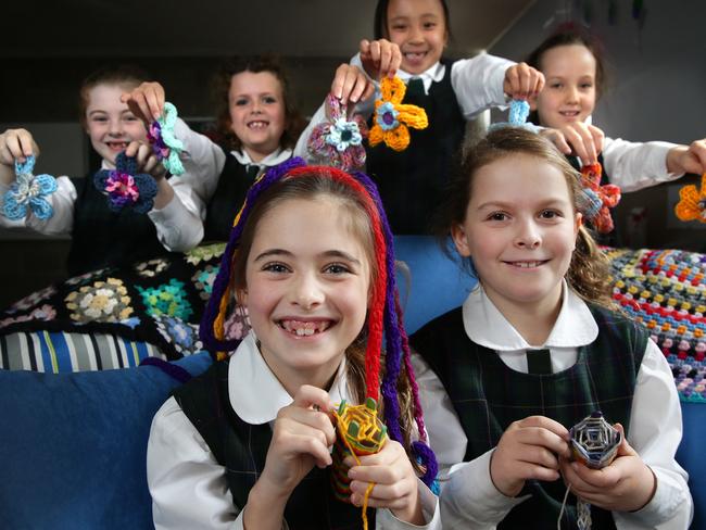 Front: Claire Biok, Lily Cowper. Back: Bella Lewis, Sienna Beecroft, Natasha Lee, Livia Hilton. Natasha’s friends are knitting flowers for their sick friend.