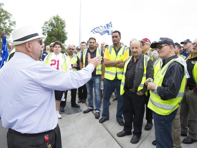 Mick Pieri, Assistant Secretary Transport Workers Union, thanks the workers for their efforts this morning at Hoxton Park. Picture: Melvyn Knipe.