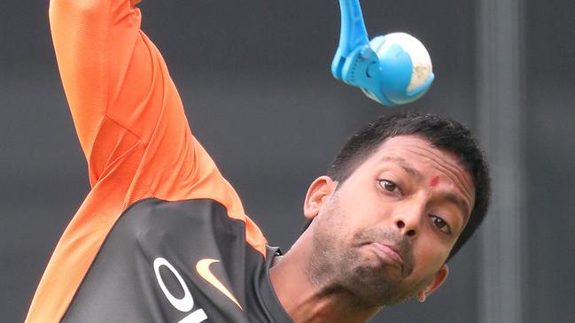 Raghu sends one down in the nets during Indian training at the Gabba. Picture: Peter Wallis