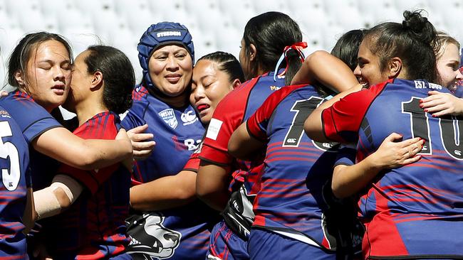 Campbelltown Collegians players celebrate their win at full time. Picture: John Appleyard