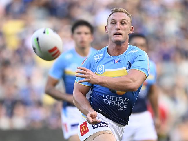 TOWNSVILLE, AUSTRALIA - APRIL 07: Tanah Boyd of the Titans passes the ball during the round five NRL match between North Queensland Cowboys and Gold Coast Titans at Qld Country Bank Stadium, on April 07, 2024, in Townsville, Australia. (Photo by Ian Hitchcock/Getty Images)