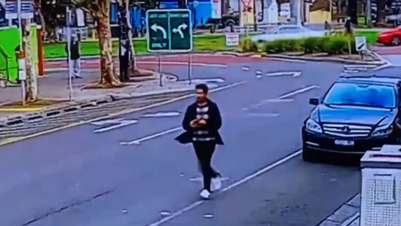 Mr Massoud attempted to chase the car before he was assisted by the driver he had been arguing with. Picture: 9 News