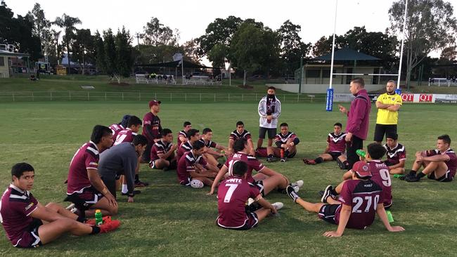 Marsden State High School Walters Cup players listen to coach Matthew Hartigan during last season.