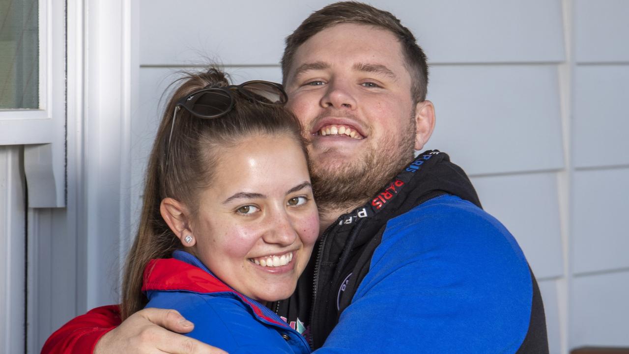 First homebuyers Baden Stewart, 21, and Claudia Towle, 21, and others like them stand to win big as rates rise. Picture: Quentin Jones