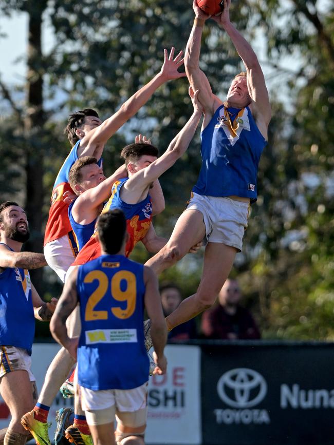 EFNL: Heathmont’s Harry Isaacs launches. Picture: Andy Brownbill