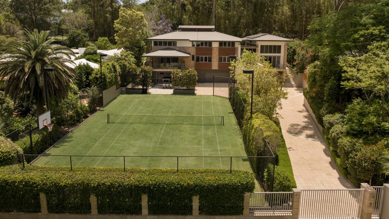 This tennis court property at 59 Gilgandra St, Indooroopilly, is on the market with Tom Lyne of Ray White and Rachael Spinks of Spinks co.