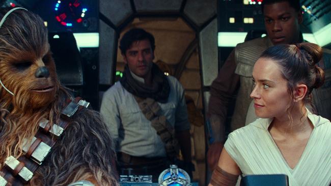 John Boyege with Joonas Suotamo, Oscar Isaac and Daisy Ridley in Star Wars: The Rise of Skywalker.