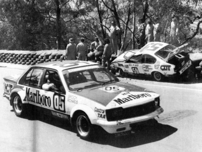 The late Peter Brock, the undisputed King of the Mountain, passes the damaged Geoff Wade’s Gemini to win the race in 1980