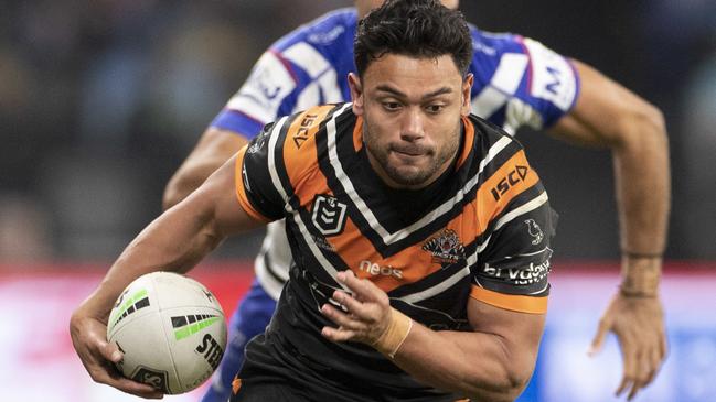 David Nofoaluma and the Tigers piled on the points against the Bulldogs. Picture: Craig Golding/AAP