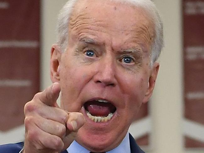 Democratic presidential candidate former Vice President Joe Biden gestures as he speaks during a campaign rally at Renaissance High School in Detroit, Michigan on March 9, 2020. (Photo by MANDEL NGAN / AFP)