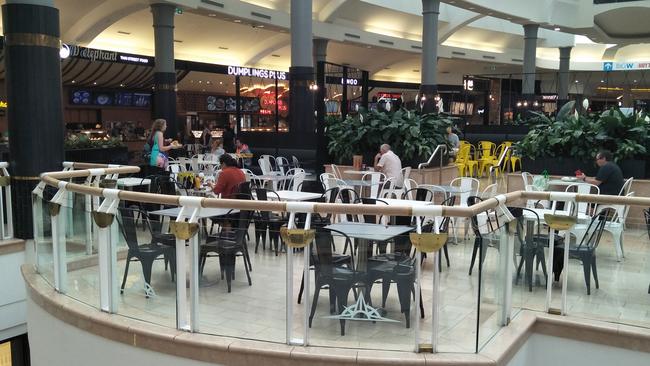 Plenty of chairs and tables are empty at the normally bustling Eastland shopping centre.