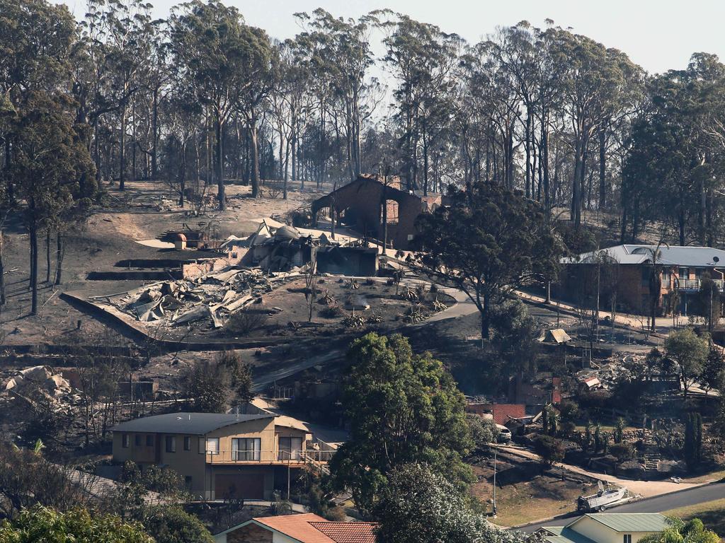 The quiet seaside town of Tathra is coming to grips with massive loss of property from a devastating bushfire that swept through the area. Up to 70 homes were destroyed in the inferno. Picture Gary Ramage