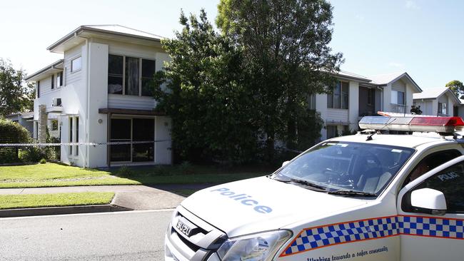 Police and Queensland Fire and Emergency Services investigate at a home in Coomera after a man’s body was found inside. Picture: Tertius Pickard