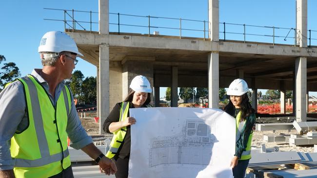 BADGE senior construction manager Mark Wyatt, site clerk Jocelyn Patzel and site engineer Princi Tandel explain the plans for Mount Gambier's multimillion dollar Wulanda Recreation &amp; Convention Centre. Picture: Jessica Ball