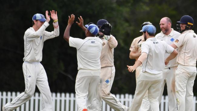 Norths players celebrate a wicket Fourth grade: Picture, John Gass