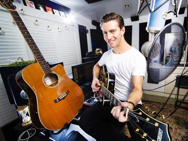 Brisbane Music Producer Magnus Murphy, 27, decided following a law career wasn‘t for him, putting down textbooks and picking up a guitar.Picture: Nigel Hallett