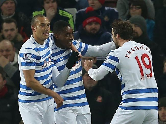 Queens Park Rangers' Dutch midfielder Leroy Fer (C) celebrates after scoring the opening goal during the English Premier League football match between Sunderland and Queens Park Rangers at the Stadium of Light in Sunderland, northeast England, on February 10, 2015. AFP PHOTO / IAN MACNICOL RESTRICTED TO EDITORIAL USE. No use with unauthorized audio, video, data, fixture lists, club/league logos or “live” services. Online in-match use limited to 45 images, no video emulation. No use in betting, games or single club/league/player publications. ”