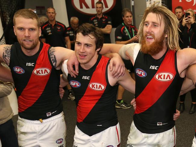 PERTH, AUSTRALIA - JUNE 21:  The Bombers sing the club song after winning the round 14 AFL match between the West Coast Eagles and the Essendon Bombers at Optus Stadium on June 21, 2018 in Perth, Australia.  (Photo by Paul Kane/Getty Images)