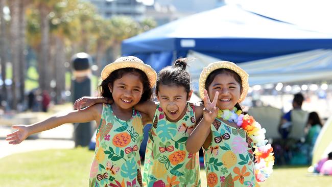 Kyla, Bella and Kenza Muhammad at Eastern Beach in Geelong on New Year’s Eve. Picture: David Smith