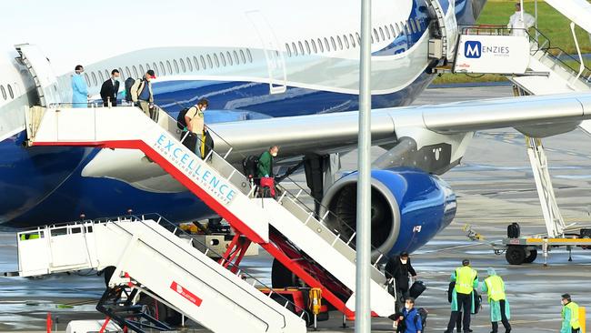 Passengers disembark from the plane. Picture: AAP