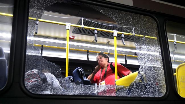 The media bus was left with multiple shattered windows from suspected stray bullets