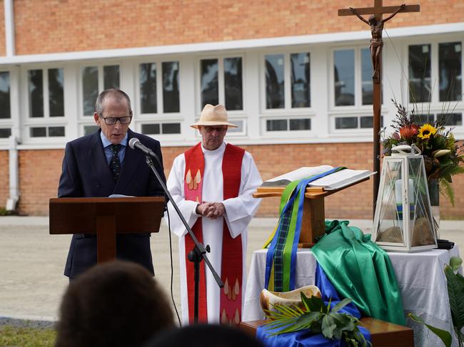 Inaugural principal Jim Ford (front) speaking at the blessing of the Catherine McAuley College building site. Friar Don White (right) conducted the blessing ceremony. Picture: Heidi Petith