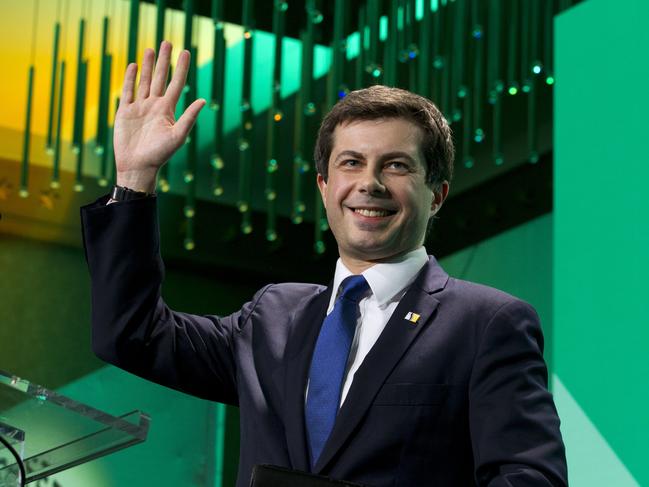 Pete Buttigieg waves as he speaks during the U.S. Conference of Mayors in Washington. Picture: AP