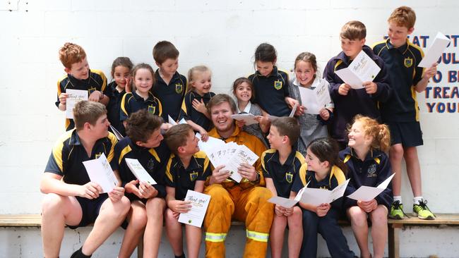 Yorketown CFS volunteer Angas McEvoy with St Columba’s students and their cards. Picture: Tait Schmaal