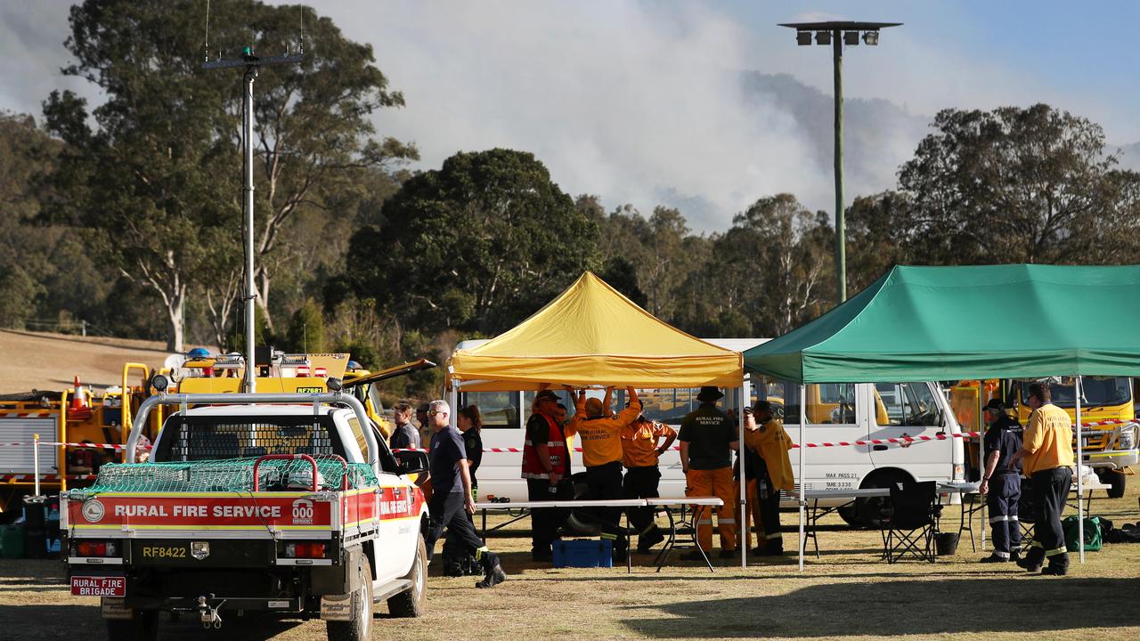 Firefighters brace for the worst as fires continue to burn in the Canungra and Sarabah regions. Canungra Show Grounds evacuation area. Picture: NIGEL HALLETT