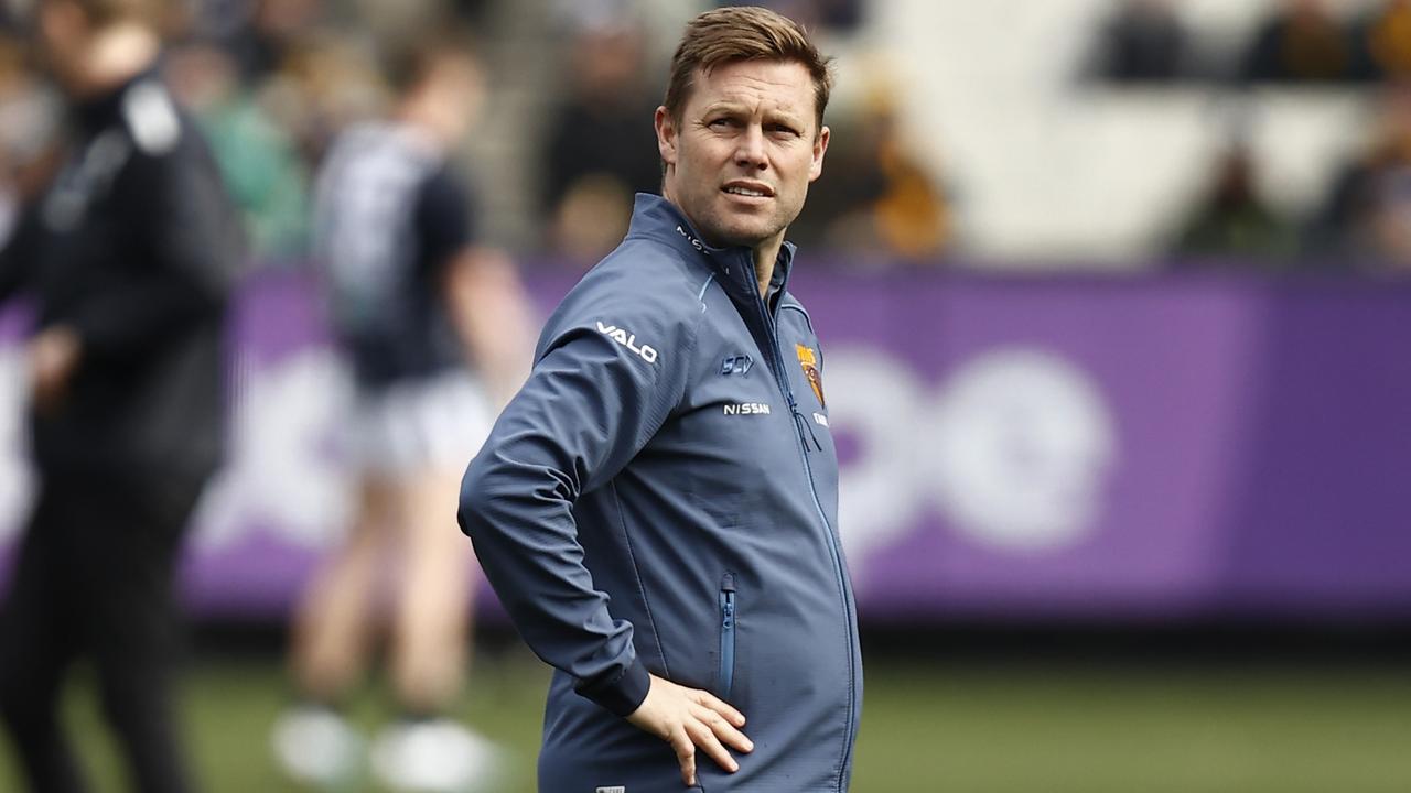 MELBOURNE, AUSTRALIA - JULY 02: Sam Mitchell, coach of the Hawks looks on in the warm up before the round 16 AFL match between Hawthorn Hawks and Carlton Blues at Melbourne Cricket Ground, on July 02, 2023, in Melbourne, Australia. (Photo by Darrian Traynor/Getty Images)