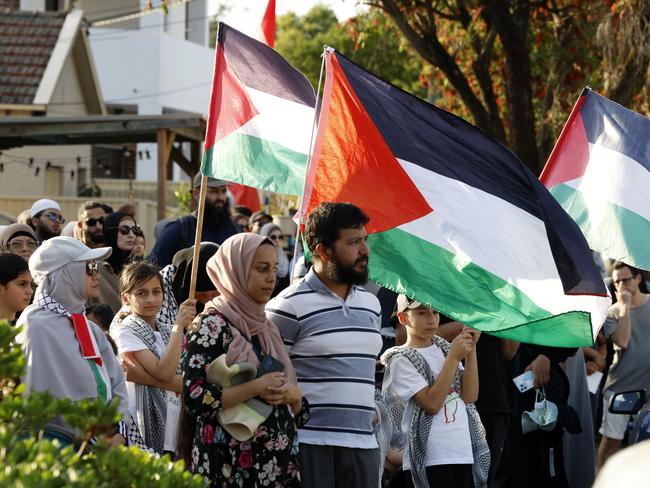 People gather for the United Community Rally for Palestine and Lebanon being held at the Lakemba Mosque. Picture: Jonathan Ng