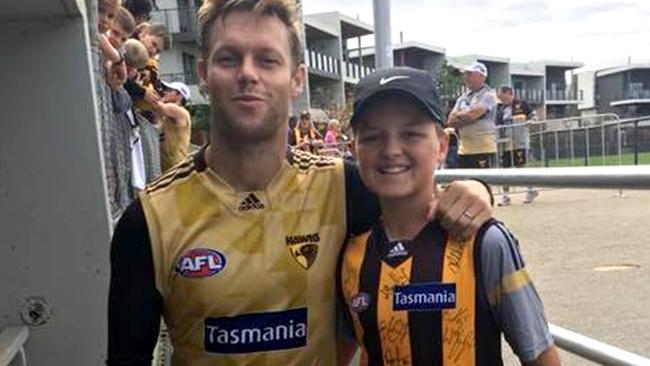 Ginnivan as a child with his idol and now coach Sam Mitchell. Picture: Facebook